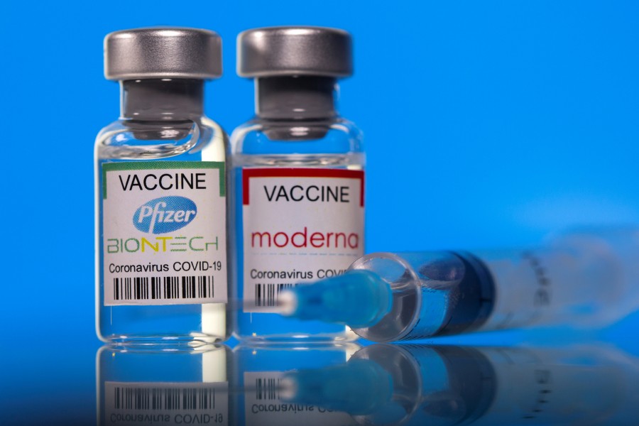 Vials with Pfizer-BioNTech and Moderna coronavirus disease (Covid-19) vaccine labels are seen in this illustration picture taken on March 19, 2021 — Reuters/Files