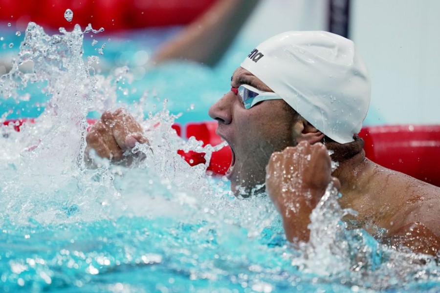 Ahmed Hafnaoui of Tunisia reacts after winning gold — Reuters photo
