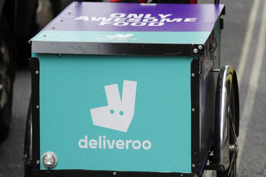 This Tuesday, July 11, 2017 file photo, shows a deliveroo logo on a bicycle in London. (AP Photo/Frank Augstein, File)