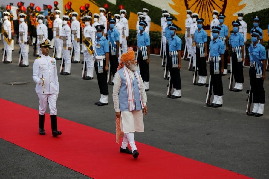 Indian Prime Minister Narendra Modi inspects the honour guard during Independence Day celebrations at the historic Red Fort in Delhi, India, August 15, 2021 — Reuters