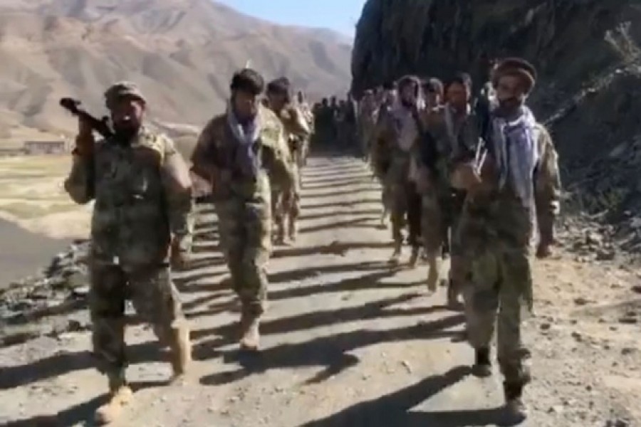 Anti-Taliban resistance troops walk in Panjshir Valley, Afghanistan August 25, 2021 in this still image taken from video — Aamaj News Agency via Reuters