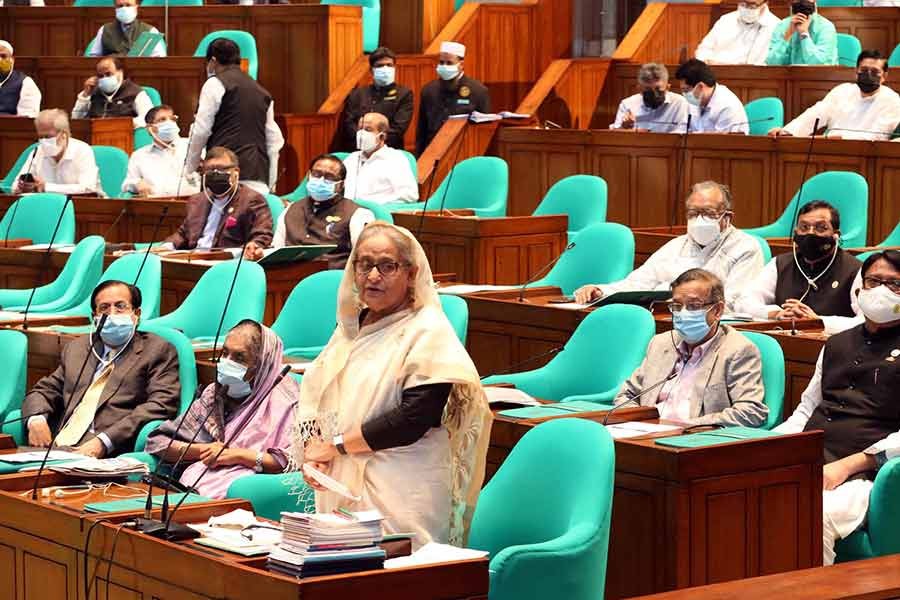 Prime Minister Sheikh Hasina taking part in a discussion on a condolence motion for a lawmaker in the parliament on Tuesday –PID Photo