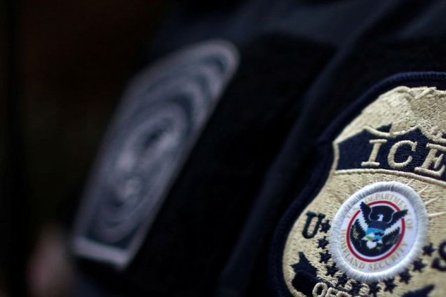 The badge of ICE Field Office Director, Enforcement and Removal Operations, David Marin and US Immigration and Customs Enforcement's (ICE) Fugitive Operations team search for a Mexican national at a home in Hawthorne, California, US on March 1, 2020 — Reuters/Files