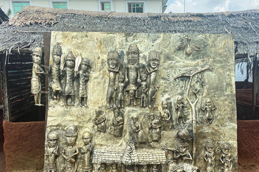 A newly made bronze plaque depicting historical events in West Africa's once mighty Kingdom of Benin, which is being offered as a gift to the British Museum, is seen on display in Benin City, Nigeria on July 31, 2021 — Reuters/Files