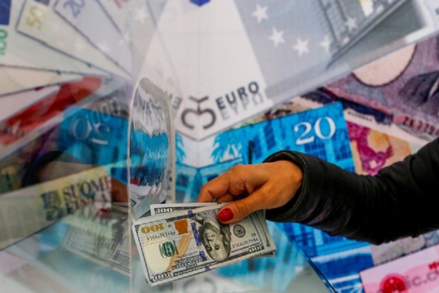 A money changer sells US dollar bills at a currency exchange office in Ankara, Turkey September 24, 2021. Reuters