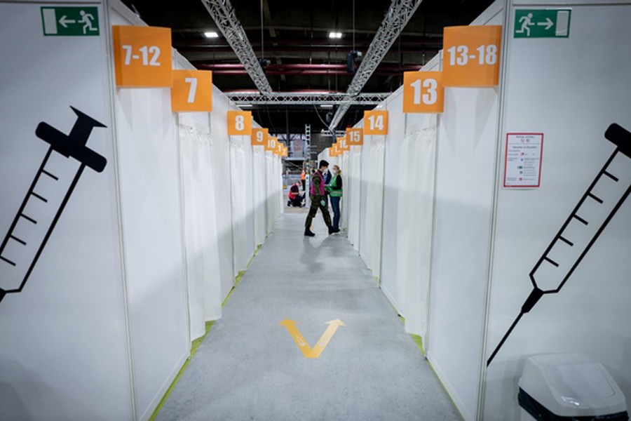 Cabins at a vaccination centre, temporarily set up in the Erika-Hess ice stadium to fight the coronavirus disease (COVID-19) pandemic are seen in Berlin, Germany, January 14, 2021. Kay Nietfeld/Pool via REUTERS
