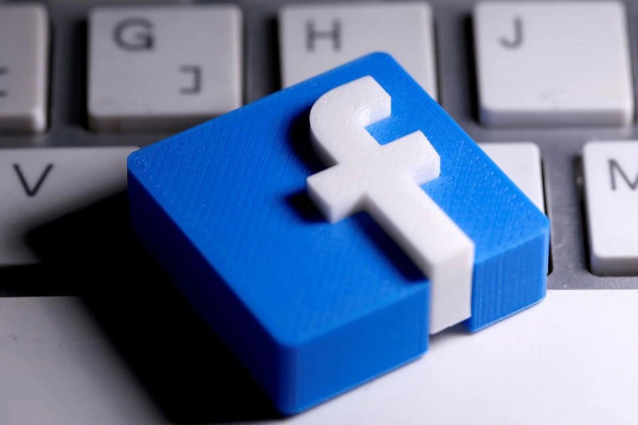 3D-printed Facebook logo is seen placed on a keyboard in this illustration taken on March 25, 2020 — Reuters/Files