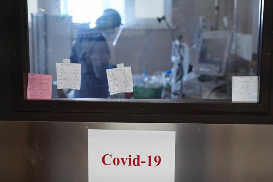 A medical specialist attends to a patient suffering from the coronavirus disease (COVID-19) at the intensive care unit (ICU) of Toxicology and Sepsis clinic of the Riga East Clinical University Hospital in Riga, Latvia. Picture taken on October 29, 2021. Reuters