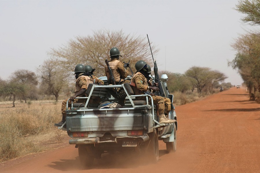 Soldiers in Burkina Faso seen patrolling an area — Reuters/Files