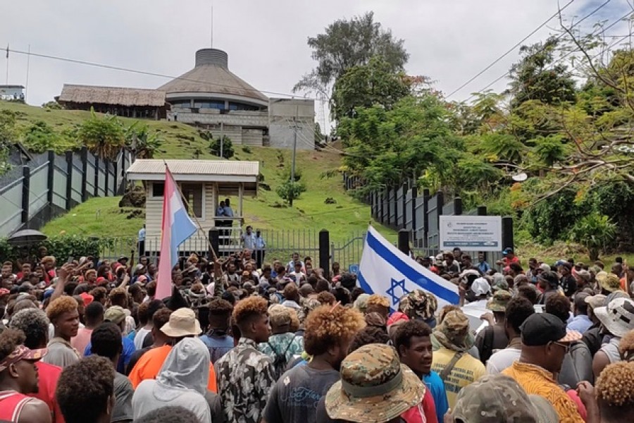 Protestors gather outside the parliament building in Honiara, Solomon Islands, Nov 24, 2021, in this screen grab obtained by Reuters, from a social media video. Georgina Kekea via REUTERS