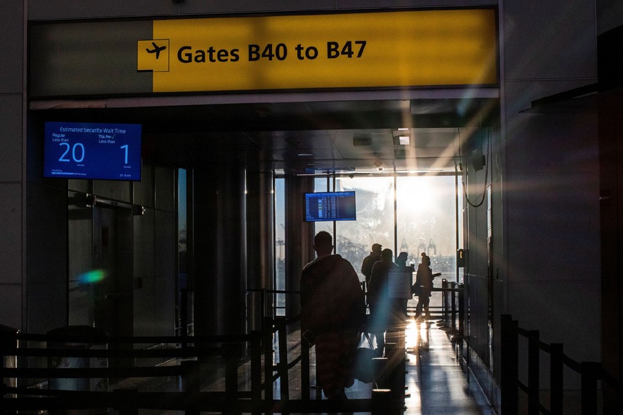 Passengers walk through the terminal at Newark Liberty International Airport in Newark, New Jersey, US on November 24, 2021 — Reuters photo