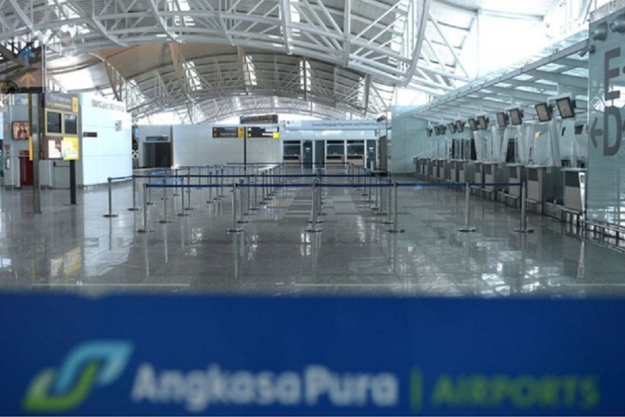 An empty view of Ngurah Rai International Airport is seen as Indonesia's resort island of Bali reopens for international flights, following border closures brought about by the coronavirus disease (COVID-19) pandemic in Badung, Bali, Indonesia October 14, 2021, in this photo taken by Antara Foto/Fikri Yusuf/via REUTERS