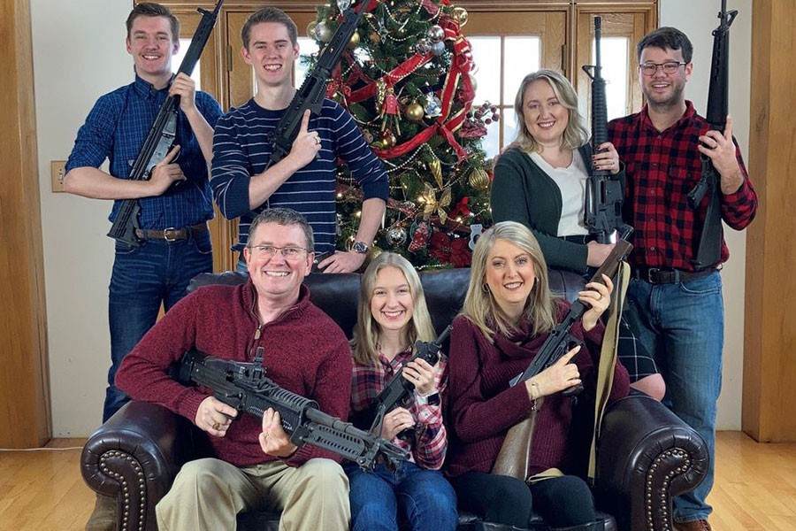 US congressman posts family Christmas picture with guns