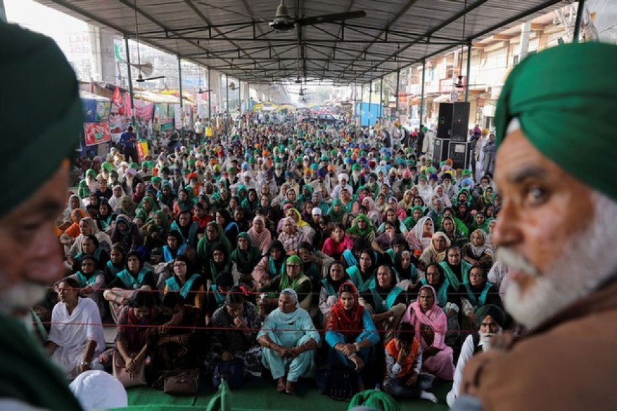 Farmers gather on the eve of the first anniversary of protests on the outskirts of Delhi at Tikri border, India, November 25, 2021. REUTERS/Anushree Fadnavis