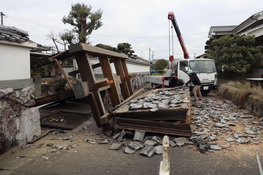 A collapsed gate to the residential house caused by an earthquake is seen in Oita, southern Japan January 22, 2022, in this photo taken by Kyodo. Mandatory credit Kyodo/via REUTERS
