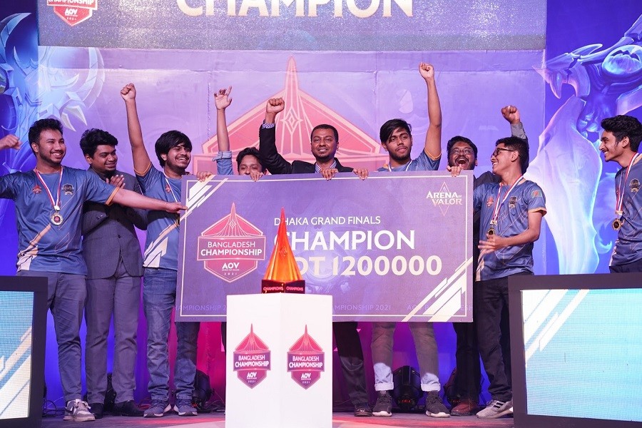Oriental Phoenix team on stage with their prize at the Arena of Valor Bangladesh Championship