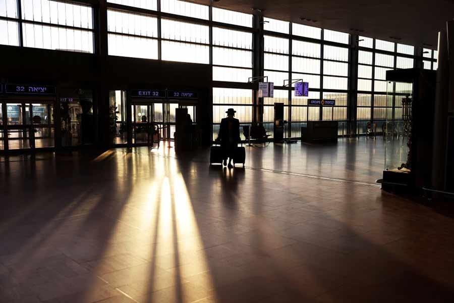 A passenger arriving at a terminal at Ben Gurion international airport in Lod near Tel Aviv of Israel on January 25 this year before Israel bans international flights in order to stop the spread of the coronavirus disease (COVID-19) and new coronavirus strains –Reuters file photo