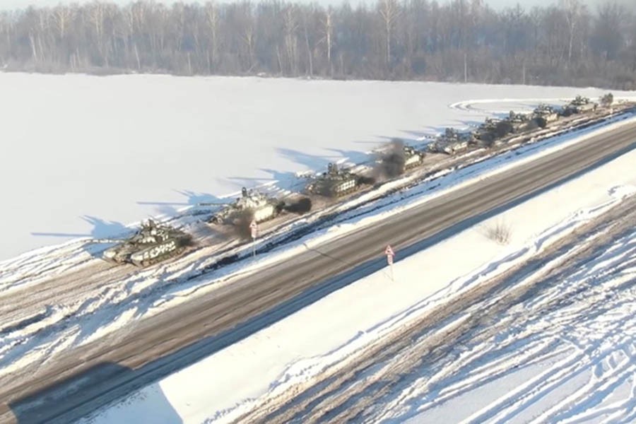 Russian tanks of the Western Military District units return to their permanent deployment sites, in an unknown location in Russia, in this still image taken from a handout video released February 15, 2022. Russian Defence Ministry/Handout via REUTERS