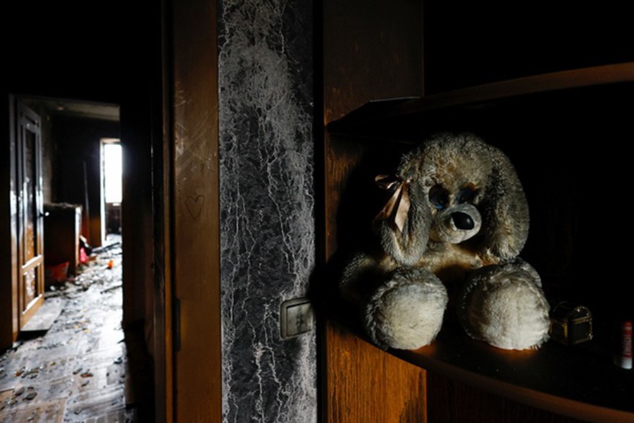 A toy is seen inside a damaged residential building, after Russia launched a massive military operation against Ukraine, in Kyiv, Ukraine Feb 25, 2022. REUTERS/Umit Bektas