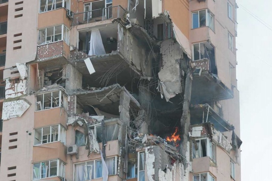 A view shows an apartment building damaged by recent shelling in Kyiv, Ukraine Feb 26, 2022 — Reuters/Gleb Garanich