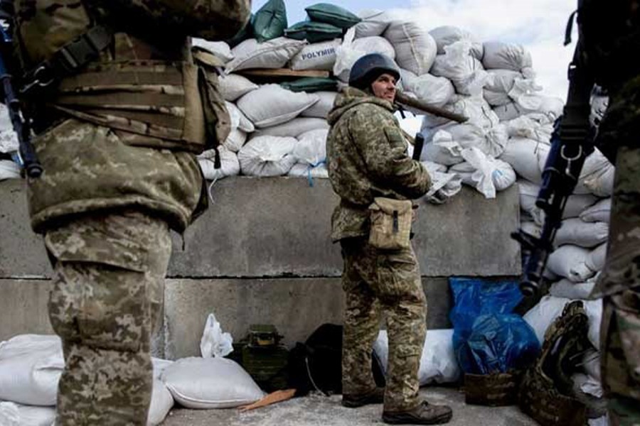 Russian invasion forces seize two small cities in Ukraine