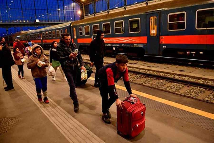An Ukranian family arriving at Nyugati station in Hungary on Sunday after Russia launched a massive military operation against Ukraine –Reuters file photo