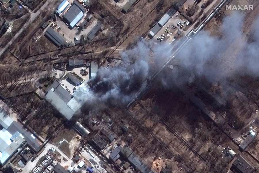 A satellite image shows a close up view of fires in an industrial area in Chernihiv of Ukraine amid Russia's invasion of Ukraine. The photo was taken by Reuters on Thursday.