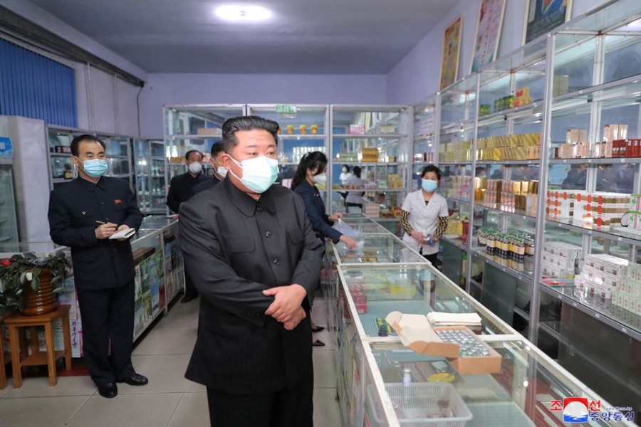 North Korean leader Kim Jong Un wears a face mask amid the coronavirus disease (COVID-19) outbreak, while inspecting a pharmacy in Pyongyang, in this undated photo released by North Korea's Korean Central News Agency (KCNA) on May 15, 2022. KCNA via REUTERS