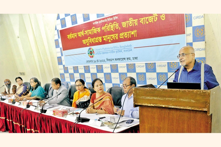 Dr Debapriya Bhattacharya, convenor of Citizen's Platform for SDGs, Bangladesh, presenting a paper on the current economic situation at a media briefing at CIRDAP hall in the capital on Monday — Focus Bangla