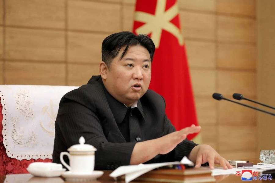 North Korean leader Kim Jong Un speaks at a politburo meeting of the Worker's Party on the country's coronavirus disease (COVID-19) outbreak response in this undated photo released by North Korea's Korean Central News Agency (KCNA) on May 21, 2022. KCNA via REUTERS