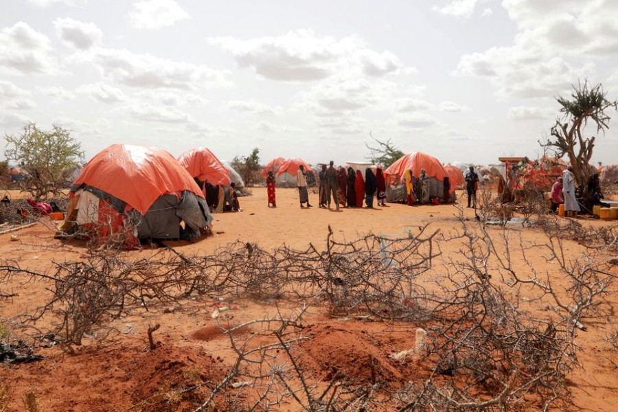 The graves of twin sisters Ebla and Abdia who died of hunger are seen at the Kaxareey camp for the internally displaced people in Dollow, Gedo region of Somalia May 24, 2022. REUTERS/Feisal Omar/File Photo