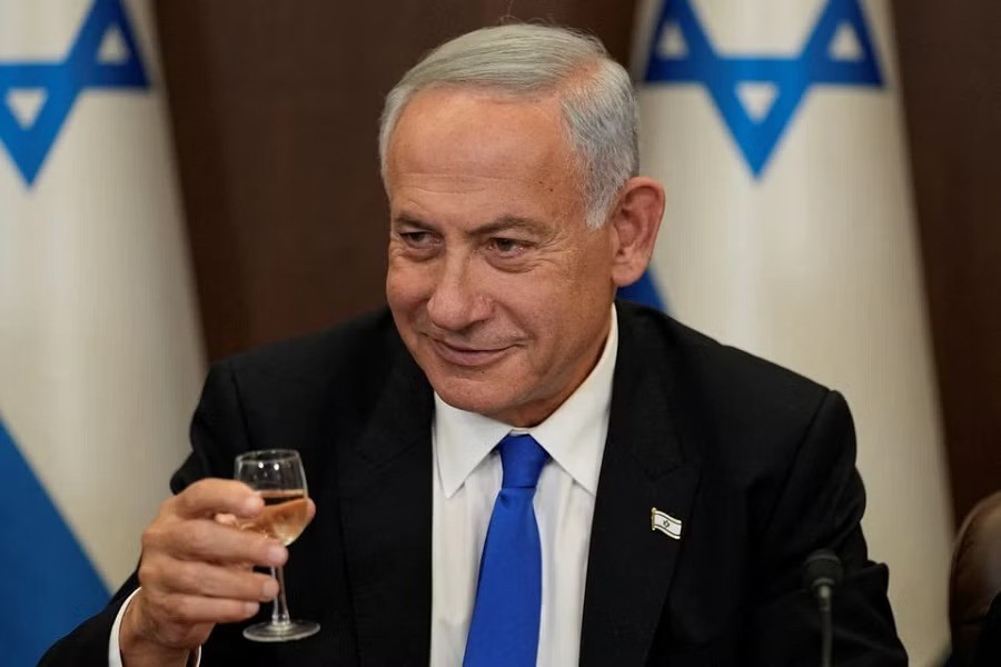 Newly sworn in Israeli Prime Minister Benjamin Netanyahu makes a toast during a cabinet meeting in Jerusalem, December 29, 2022.REUTERS