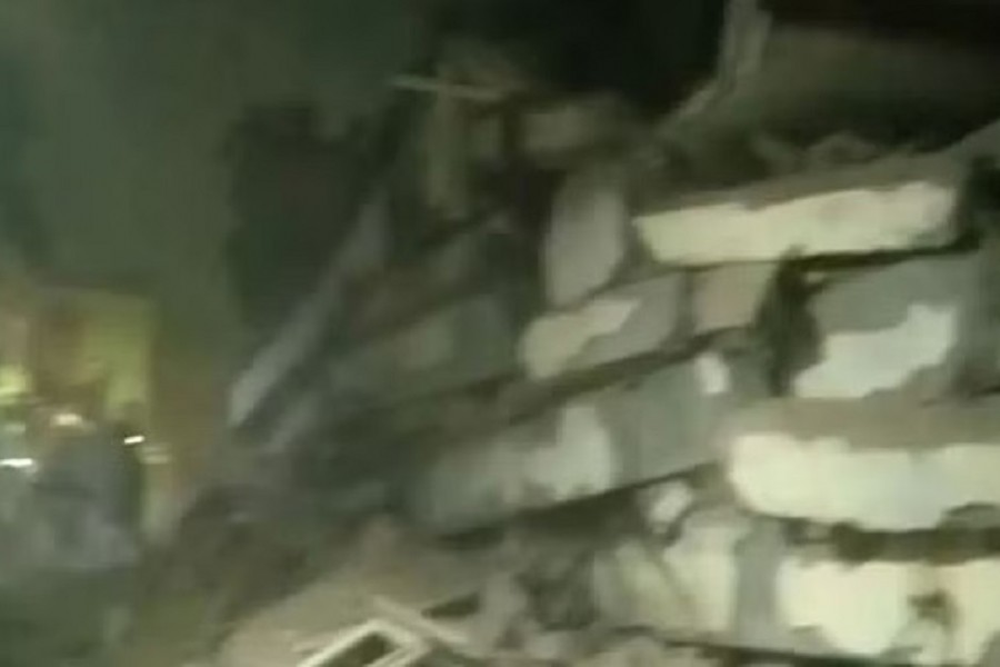 A screengrab of a video of a collapsed building in Lucknow, India. Photo: Courtesy of NDTV