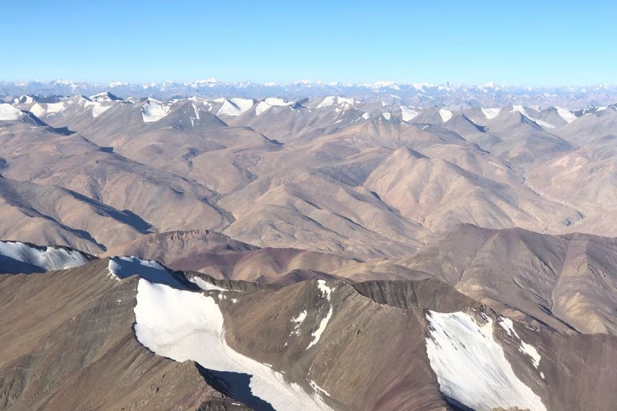 Snow-covered mountain range is seen from a passenger airplane in Ladakh region September 14, 2020. REUTERS/Danish Siddiqui
