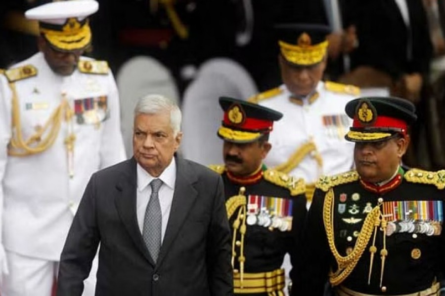Sri Lanka's President Ranil Wickremesinghe arrives with commanders of three forces to attend the country's 75th Independence Day celebrations in Colombo, Sri Lanka, Feb 4, 2023. REUTERS